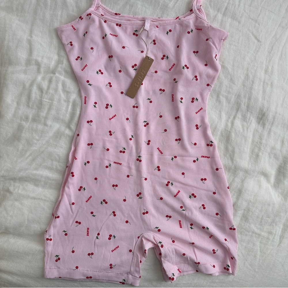 skims cherry pink onesie